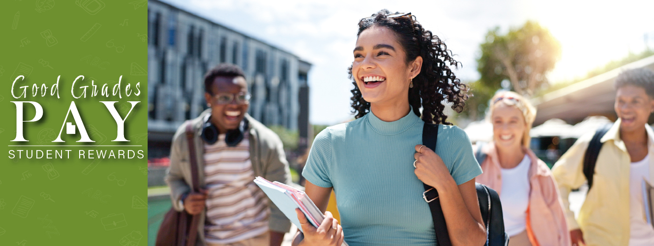 Good grades pay student with backpack walking