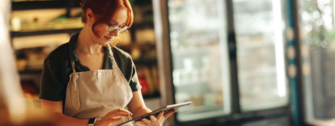 Shop owner using tablet